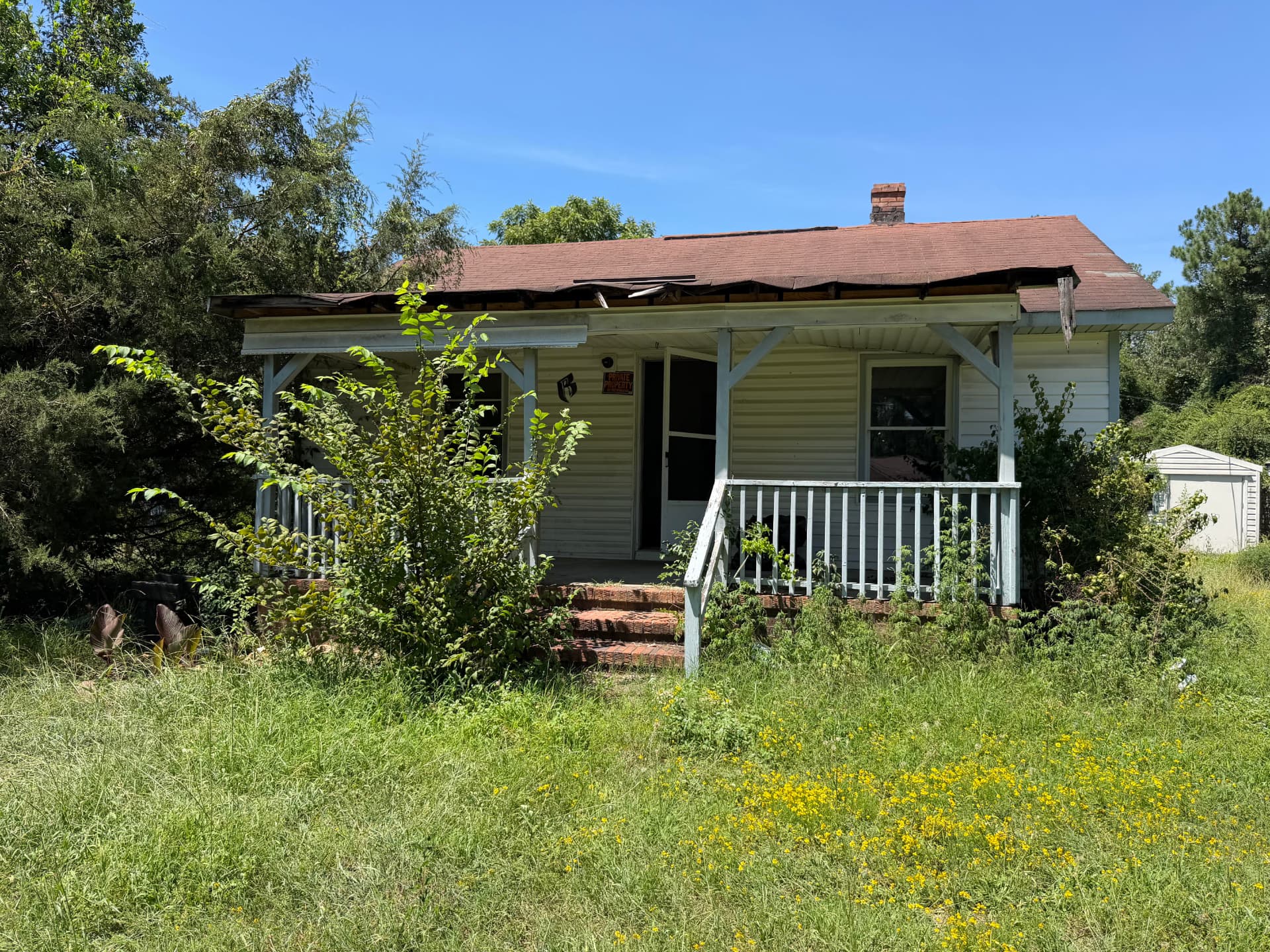 Front view of the recently acquired Cumberland County ranch home before renovation